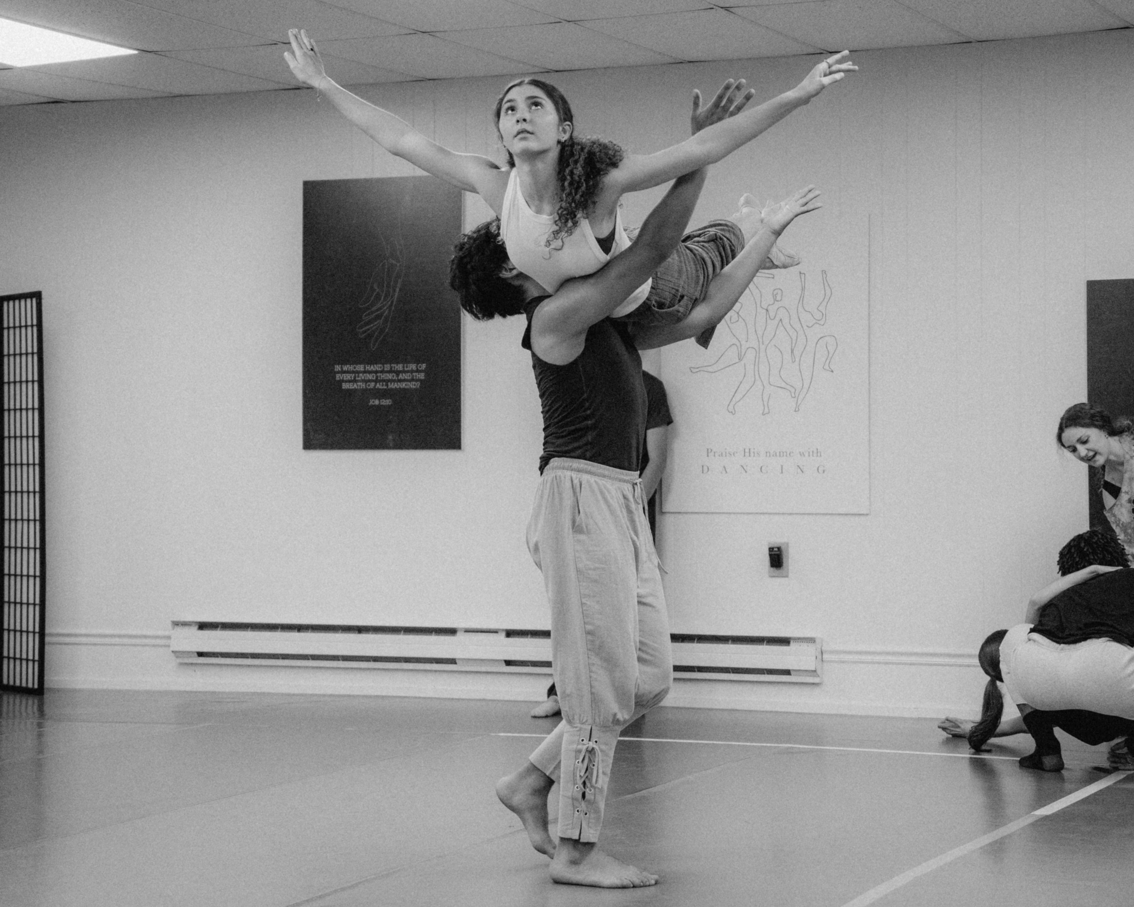 VelaDance partnering lift with open arms in studio — professional dance company New Jersey